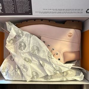 Brand new, never worn light pink tims